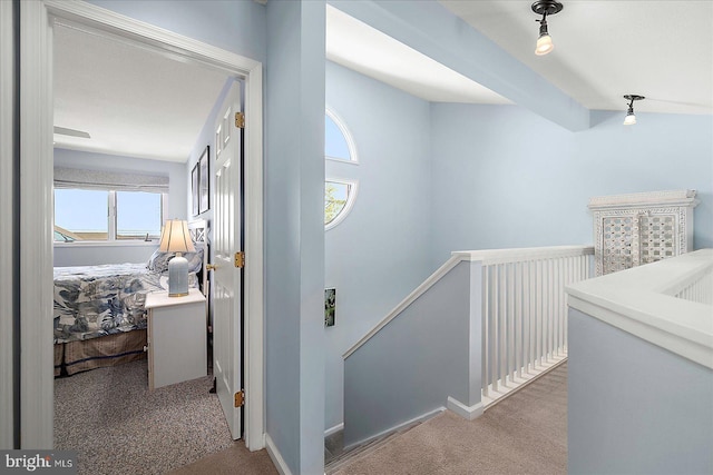 39724 E Sun Dr Unit 226, Fenwick Island, DE 19944 - hallway featuring carpet flooring and an upstairs landing