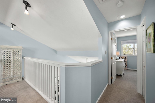 39724 E Sun Dr Unit 226, Fenwick Island, DE 19944 - hall with carpet, an upstairs landing, baseboards, and lofted ceiling