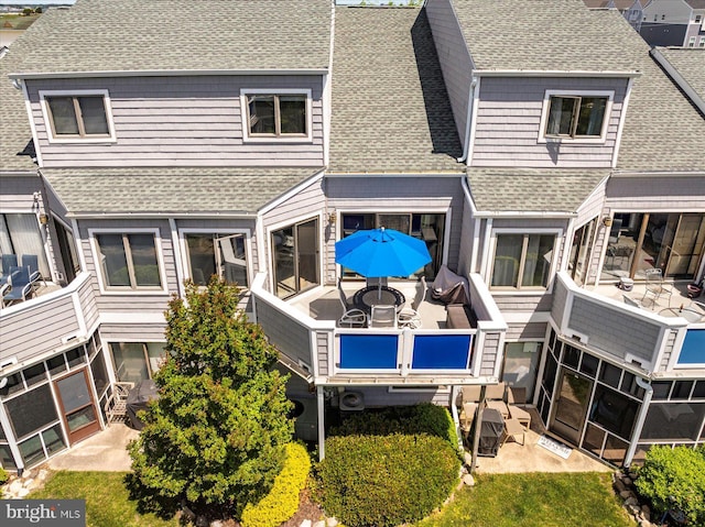 39724 E Sun Dr Unit 226, Fenwick Island, DE 19944 - rear view of property with roof with shingles