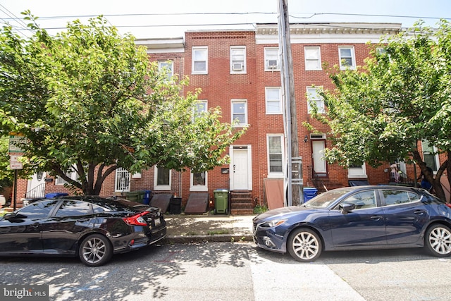 2116 E Hoffman St, Baltimore, MD 21213 - view of front facade featuring entry steps and brick siding