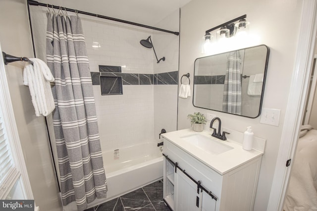 2116 E Hoffman St, Baltimore, MD 21213 - bathroom featuring vanity, shower / bath combo, and marble look tile flooring