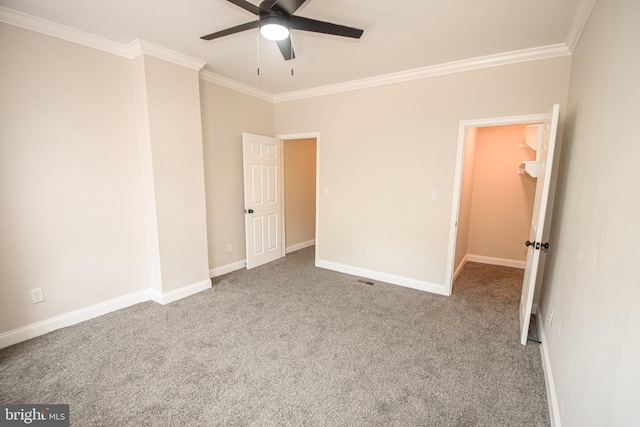 2116 E Hoffman St, Baltimore, MD 21213 - empty room with ornamental molding, a ceiling fan, and carpet flooring