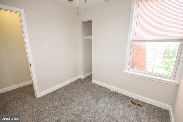 2116 E Hoffman St, Baltimore, MD 21213 - unfurnished bedroom with carpet floors and a closet
