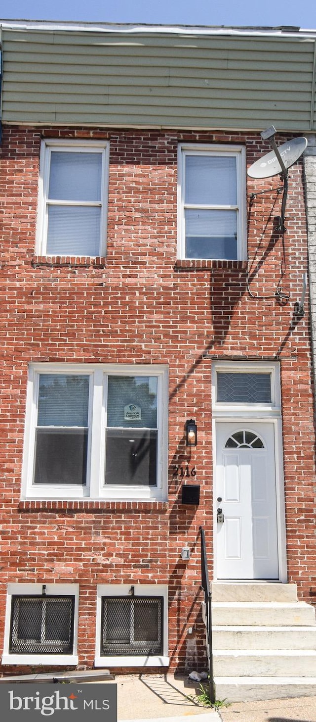2116 E Hoffman St, Baltimore, MD 21213 - view of front facade with brick siding