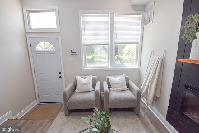2116 E Hoffman St, Baltimore, MD 21213 - entryway with wood finished floors and baseboards