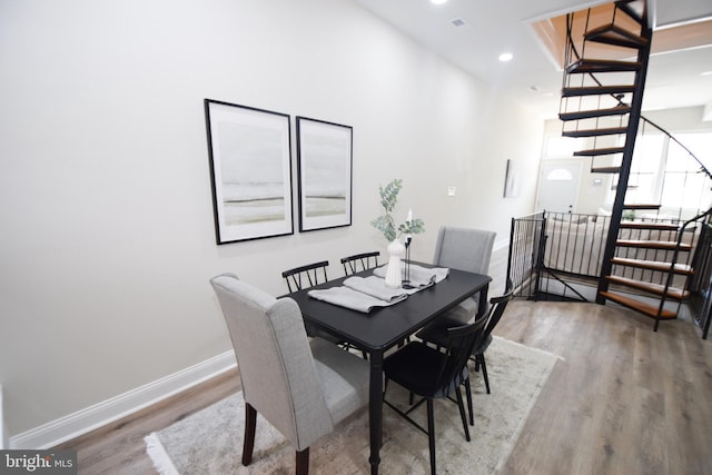 2116 E Hoffman St, Baltimore, MD 21213 - dining room featuring wood finished floors, recessed lighting, and stairs