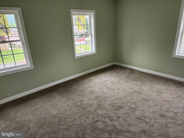 51 Maple St, Cumberland, MD 21502 - carpeted spare room featuring healthy amount of natural light and baseboards