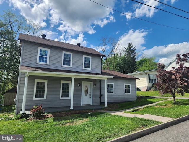 51 Maple St, Cumberland, MD 21502 - view of front of property with covered porch and a front yard