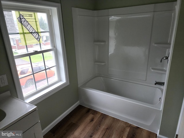 51 Maple St, Cumberland, MD 21502 - full bath with plenty of natural light, baseboards, vanity, and wood finished floors