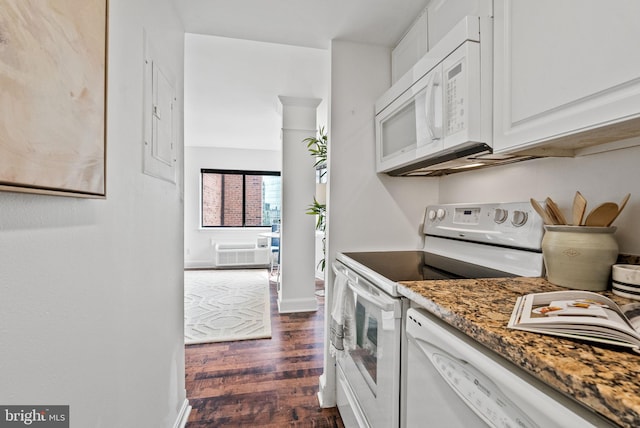 1825 T St NW Unit 701, Washington, DC 20009 - kitchen with white appliances, dark wood-type flooring, decorative columns, and white cabinetry