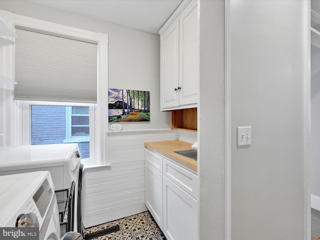 546 N Plum St, Lancaster, PA 17602 - laundry room with separate washer and dryer and cabinet space