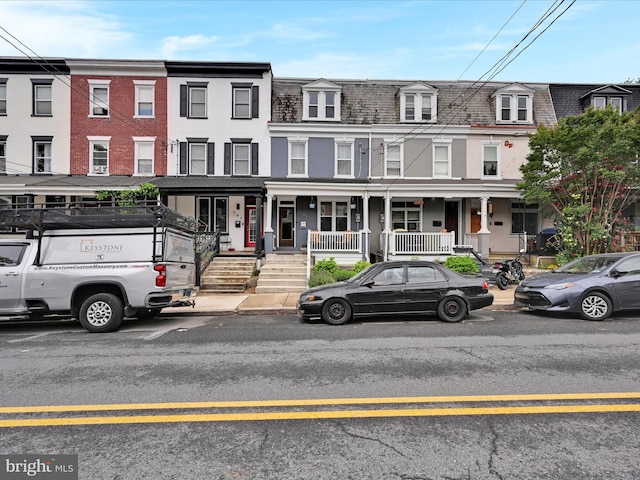 546 N Plum St, Lancaster, PA 17602 - townhome / multi-family property with covered porch and mansard roof