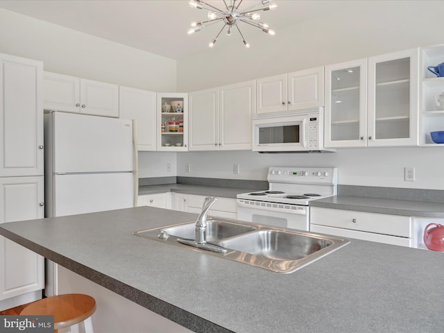 1082 Stillwood Cir, Lititz, PA 17543 - kitchen featuring white appliances, white cabinetry, and dark countertops