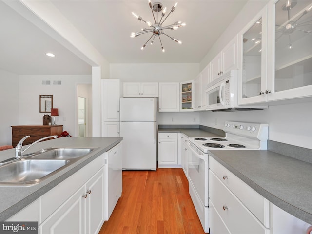 1082 Stillwood Cir, Lititz, PA 17543 - kitchen with white appliances, white cabinets, a chandelier, light wood finished floors, and recessed lighting