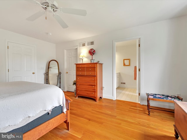 1082 Stillwood Cir, Lititz, PA 17543 - bedroom with light wood-type flooring, ensuite bath, and ceiling fan