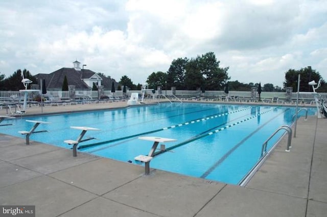 1082 Stillwood Cir, Lititz, PA 17543 - community pool featuring a diving board and a patio