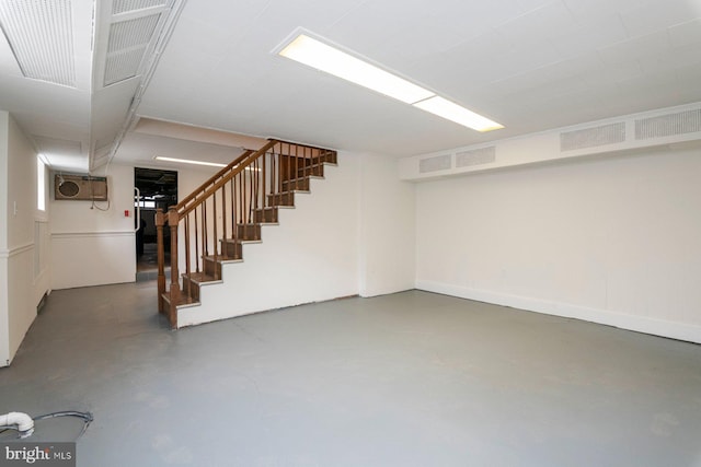 2638 E Baltimore St, Baltimore, MD 21224 - finished basement featuring stairs and a wall unit AC