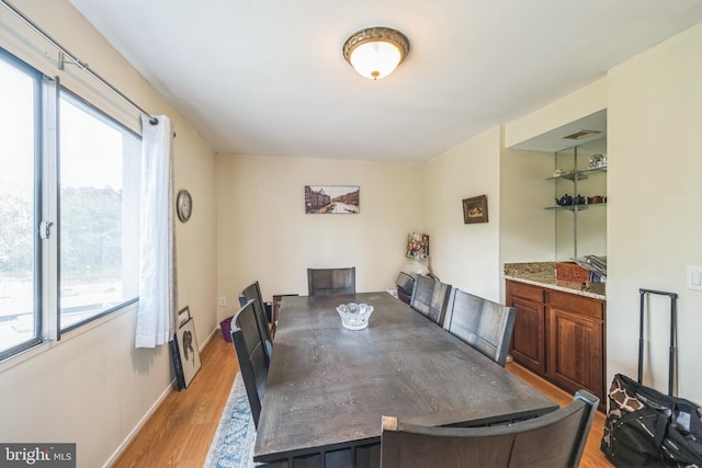 6101 Edsall Rd Unit 702, Alexandria, VA 22304 - dining room featuring healthy amount of natural light and light wood-type flooring