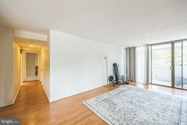 6101 Edsall Rd Unit 702, Alexandria, VA 22304 - unfurnished living room with light wood-style flooring