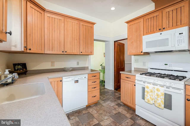 212 S Union Ave, Havre De Grace, MD 21078 - kitchen featuring white appliances, a sink, light countertops, dark stone finish flooring, and recessed lighting