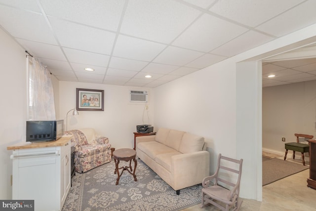 212 S Union Ave, Havre De Grace, MD 21078 - living area featuring a drop ceiling, a wall unit AC, and recessed lighting