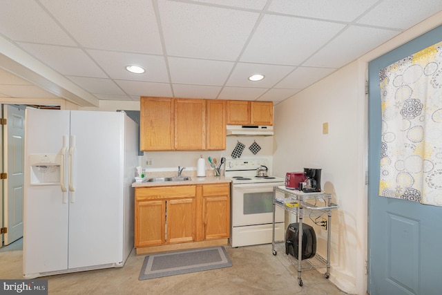 212 S Union Ave, Havre De Grace, MD 21078 - kitchen with white appliances, under cabinet range hood, a sink, a drop ceiling, and concrete flooring