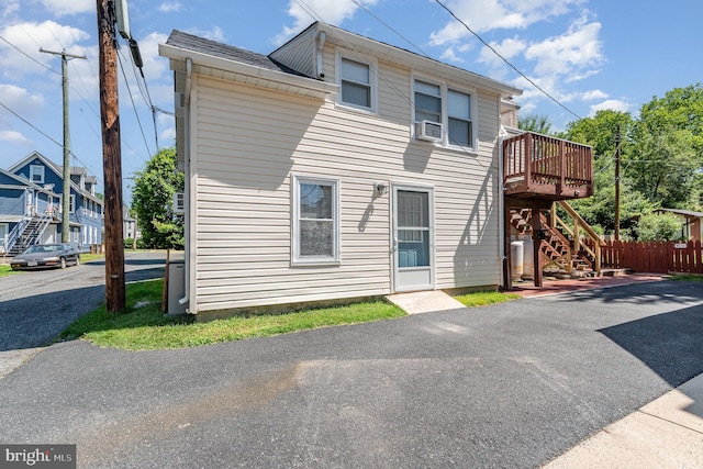 212 S Union Ave, Havre De Grace, MD 21078 - back of property with stairway, a deck, and cooling unit