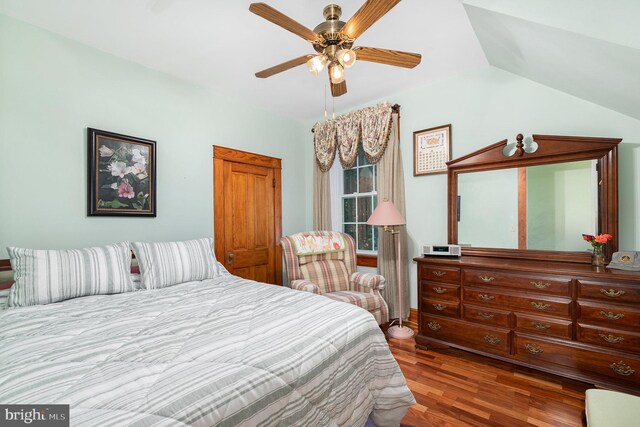 212 S Union Ave, Havre De Grace, MD 21078 - bedroom with wood finished floors, vaulted ceiling, and ceiling fan