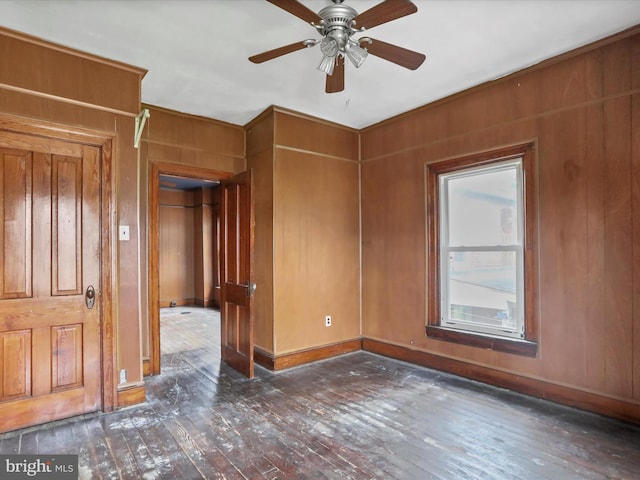 16 Avalon Ave, Hagerstown, MD 21740 - unfurnished room with hardwood / wood-style flooring, a ceiling fan, baseboards, and wood walls
