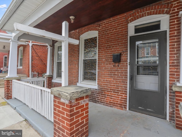 16 Avalon Ave, Hagerstown, MD 21740 - property entrance with covered porch and brick siding