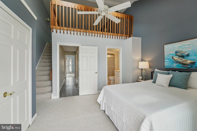 15 Queen Anne Way Unit E, Chester, MD 21619 - carpeted bedroom featuring baseboards, a high ceiling, and ensuite bath