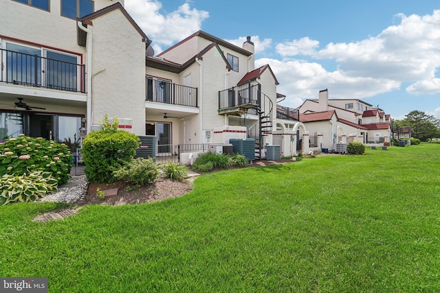 15 Queen Anne Way Unit E, Chester, MD 21619 - view of yard featuring central air condition unit and a ceiling fan