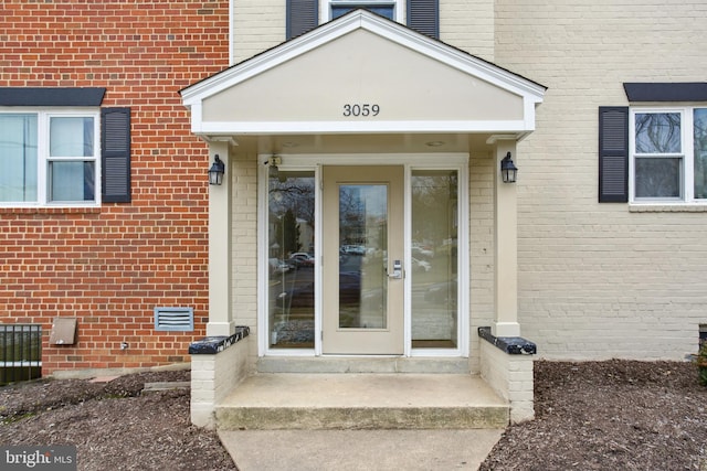 3059 Patrick Henry Dr Unit 201, Falls Church, VA 22044 - view of exterior entry featuring brick siding