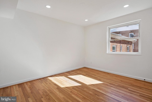 3059 Patrick Henry Dr Unit 201, Falls Church, VA 22044 - unfurnished room featuring wood finished floors, baseboards, and recessed lighting