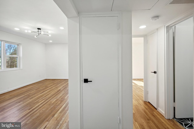 3059 Patrick Henry Dr Unit 201, Falls Church, VA 22044 - corridor with light wood finished floors, attic access, recessed lighting, and baseboards