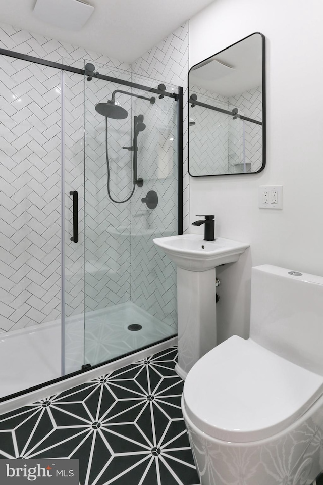 3059 Patrick Henry Dr Unit 201, Falls Church, VA 22044 - bathroom featuring a shower stall and toilet