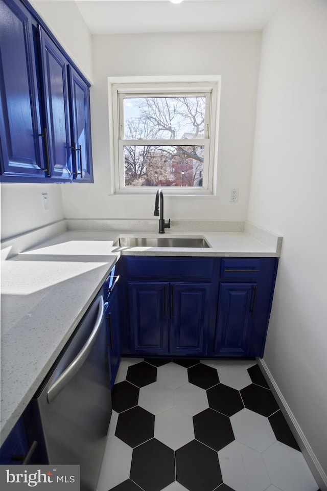 3059 Patrick Henry Dr Unit 201, Falls Church, VA 22044 - kitchen featuring a sink, blue cabinetry, stainless steel dishwasher, and light stone countertops