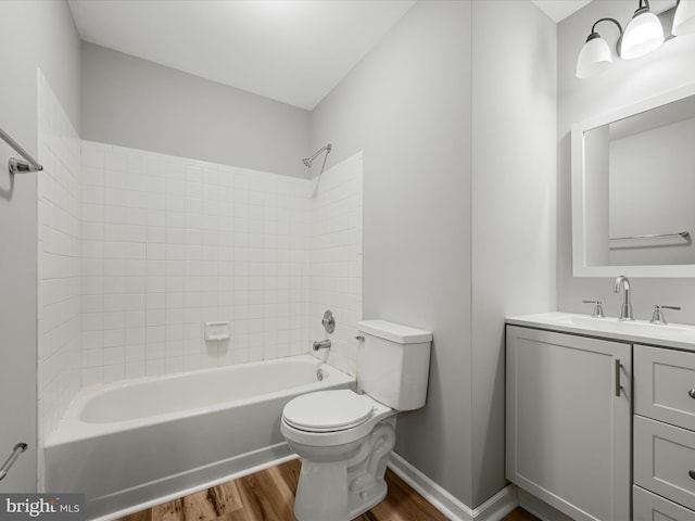 237 Kimberly Way, Winchester, VA 22601 - bathroom featuring wood finished floors, toilet, vanity, bathing tub / shower combination, and baseboards