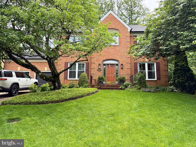 10000 Manor Pl, Fairfax, VA 22032 - view of front of house featuring brick siding and a front yard