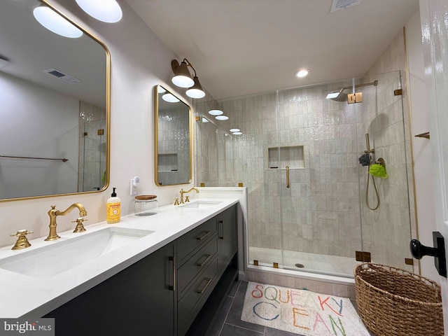 10000 Manor Pl, Fairfax, VA 22032 - bathroom with a shower stall, double vanity, tile patterned floors, and recessed lighting