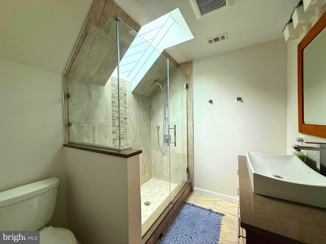 10000 Manor Pl, Fairfax, VA 22032 - bathroom with toilet, vanity, a shower stall, baseboards, and wood finished floors