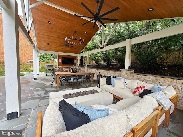 10000 Manor Pl, Fairfax, VA 22032 - view of patio featuring an outdoor living space with a fire pit, outdoor dining area, and a ceiling fan