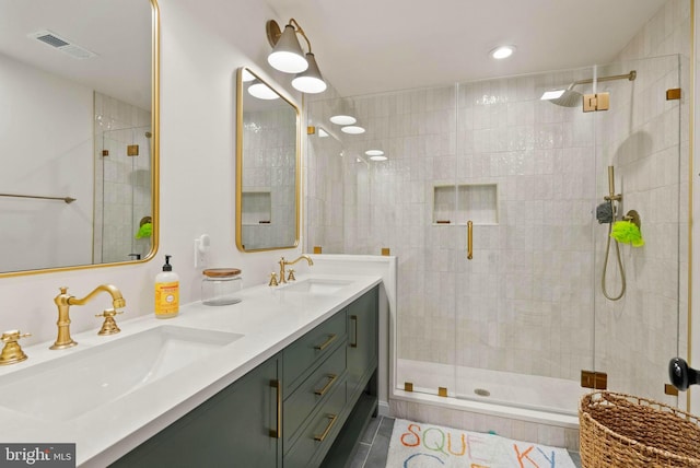 10000 Manor Pl, Fairfax, VA 22032 - full bathroom featuring a stall shower, double vanity, tile patterned floors, and recessed lighting