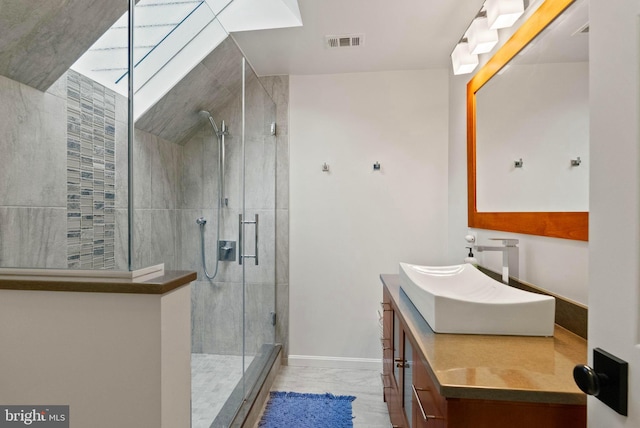 10000 Manor Pl, Fairfax, VA 22032 - bathroom featuring a stall shower, vanity, and baseboards