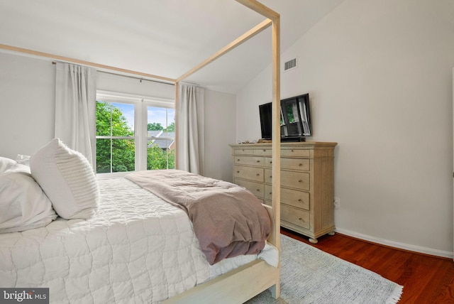 10000 Manor Pl, Fairfax, VA 22032 - bedroom with vaulted ceiling, wood finished floors, and baseboards