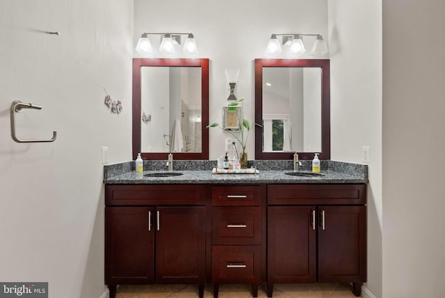 10000 Manor Pl, Fairfax, VA 22032 - full bath featuring double vanity, tile patterned flooring, and baseboards