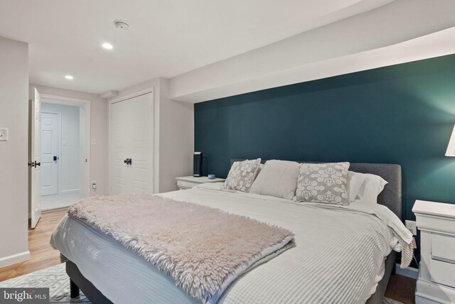 10000 Manor Pl, Fairfax, VA 22032 - bedroom with light wood-style flooring, recessed lighting, and baseboards