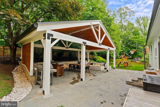 10000 Manor Pl, Fairfax, VA 22032 - view of patio / terrace with an outdoor living space, a gazebo, and a playground
