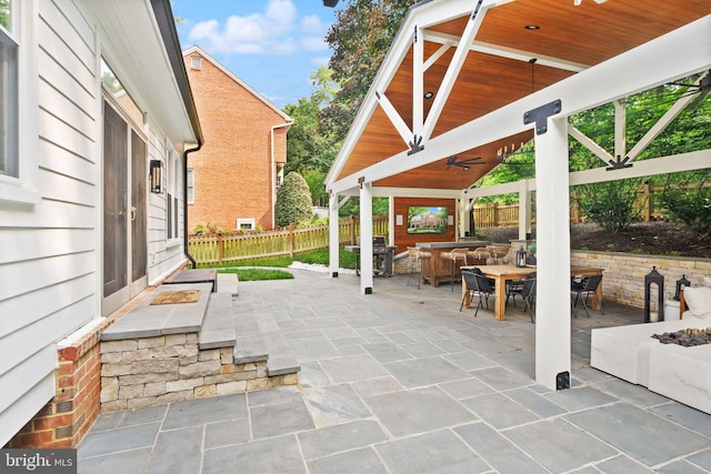 10000 Manor Pl, Fairfax, VA 22032 - view of patio / terrace featuring a gazebo, outdoor dining area, a grill, and a fire pit