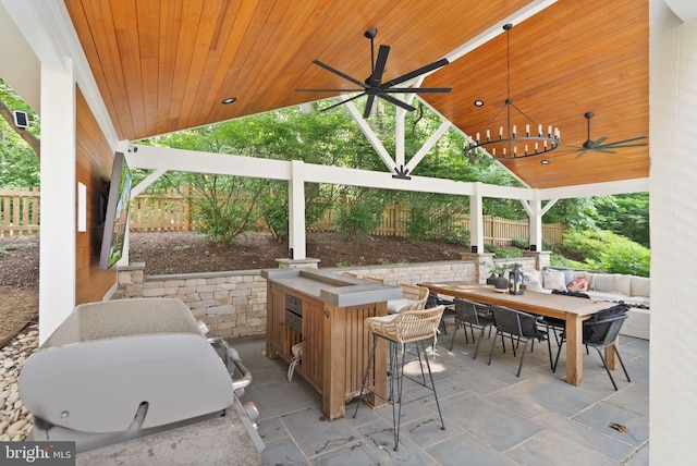 10000 Manor Pl, Fairfax, VA 22032 - fenced backyard with ceiling fan, outdoor dining space, and a patio
